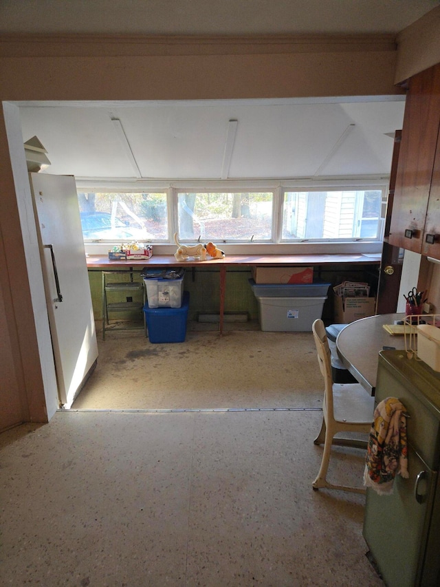 interior space with crown molding