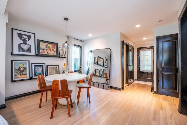 dining area with light wood-type flooring