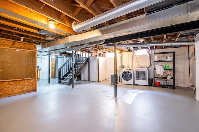 basement featuring washing machine and dryer