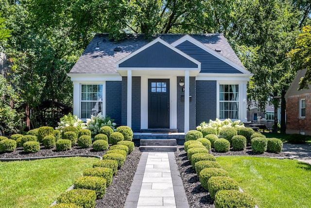 view of front of home with a front yard