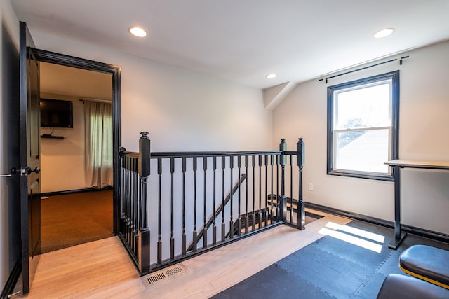 bedroom with hardwood / wood-style flooring