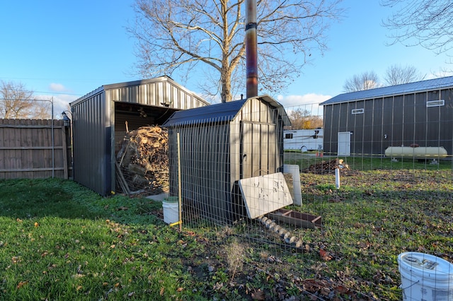 view of outbuilding with a lawn