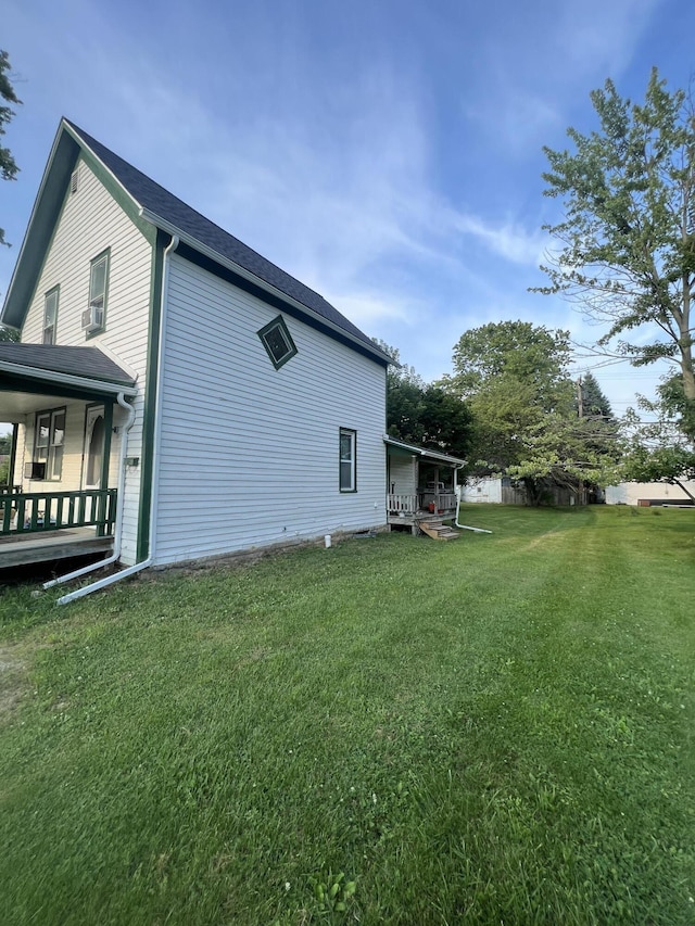 view of home's exterior featuring a lawn