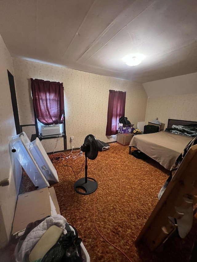 carpeted bedroom with vaulted ceiling