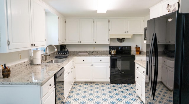 kitchen featuring white cabinets, black appliances, sink, light tile patterned floors, and range hood