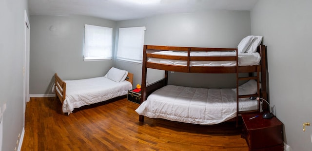 bedroom with hardwood / wood-style floors