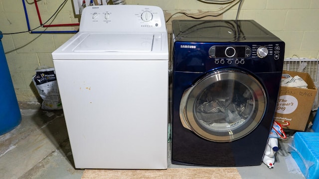 laundry area featuring separate washer and dryer