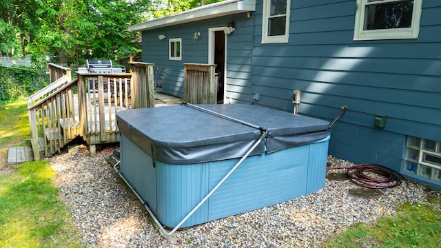 exterior space featuring a hot tub