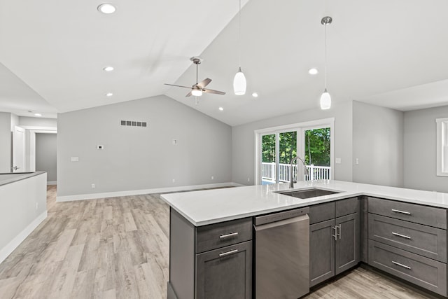 kitchen featuring lofted ceiling, sink, light hardwood / wood-style flooring, dishwasher, and decorative light fixtures