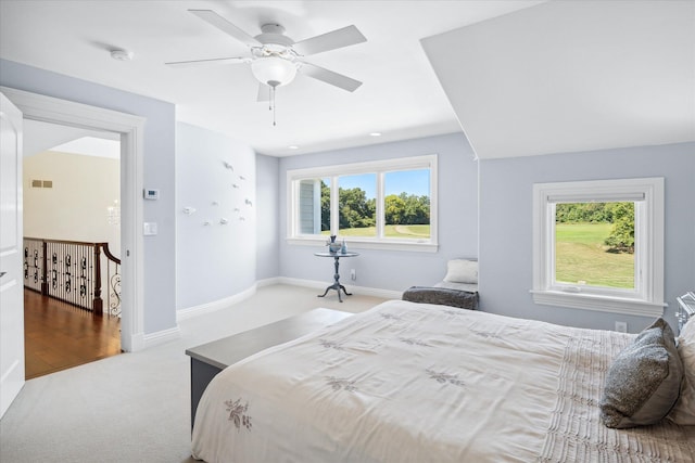 carpeted bedroom with ceiling fan