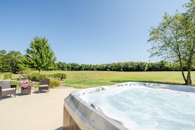 view of patio / terrace with a hot tub