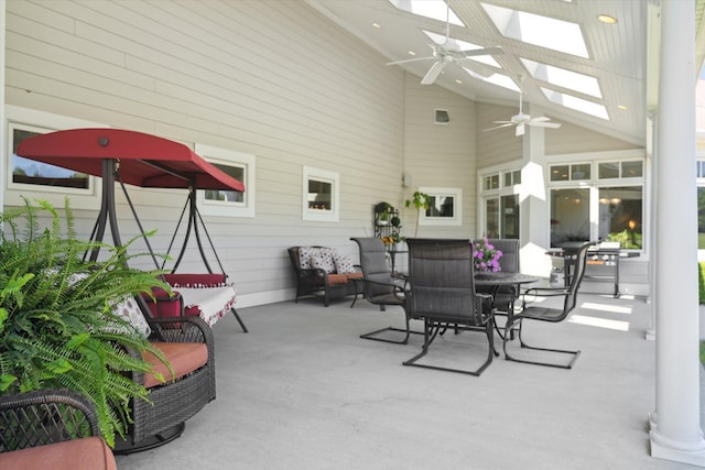 view of patio featuring ceiling fan