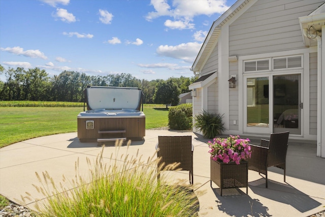 view of patio / terrace featuring a hot tub