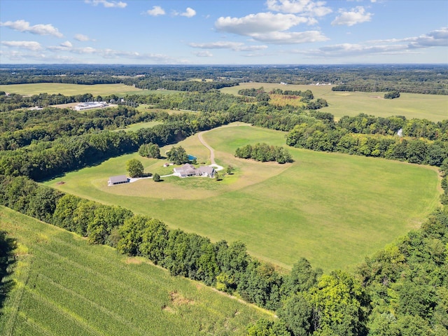 birds eye view of property with a rural view