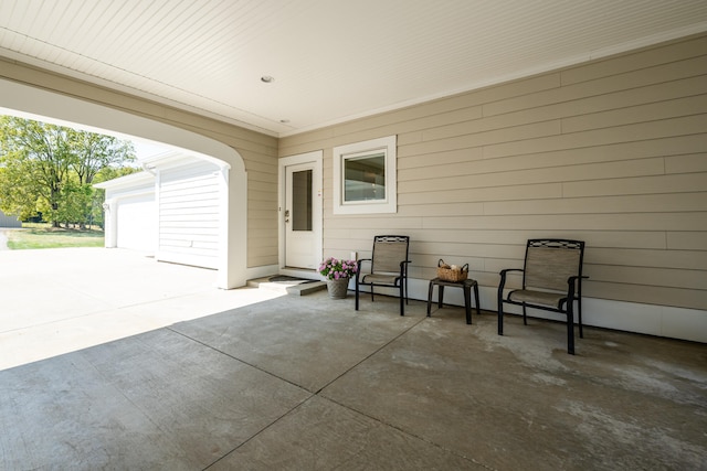 view of patio / terrace with a garage