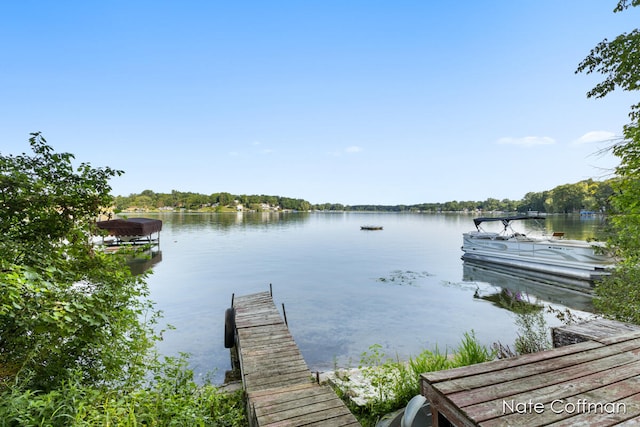 view of dock with a water view