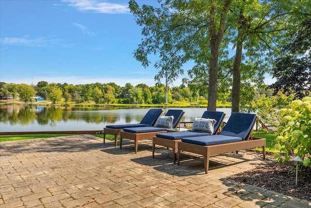 view of patio with a water view