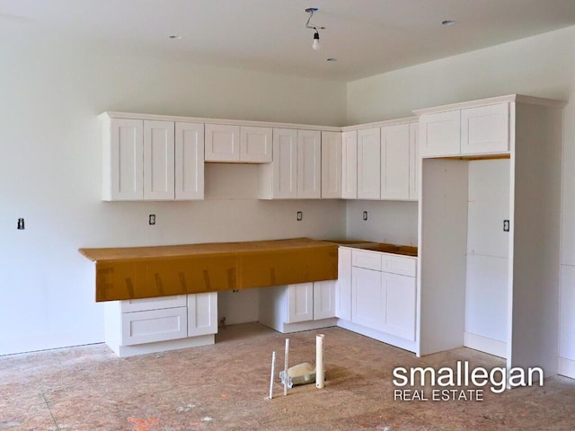 kitchen featuring white cabinetry