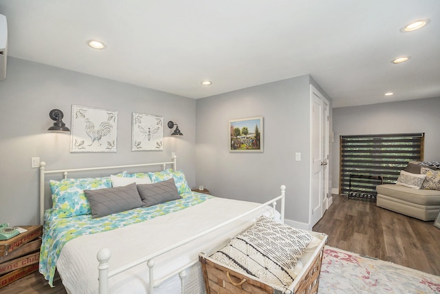 bedroom featuring dark hardwood / wood-style floors