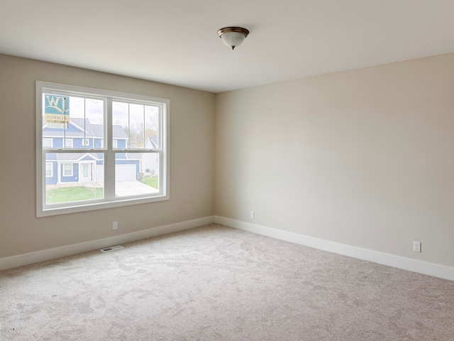 view of carpeted spare room