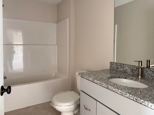 full bathroom featuring vanity, shower / tub combination, and toilet