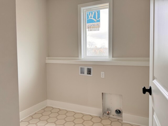 laundry room featuring washer hookup and hookup for a gas dryer