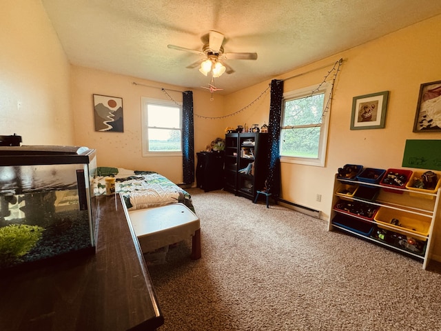 carpeted bedroom featuring a textured ceiling and ceiling fan