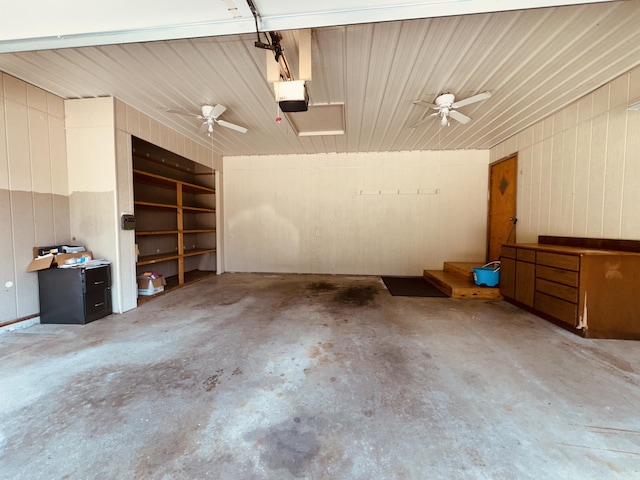 garage featuring a garage door opener and ceiling fan