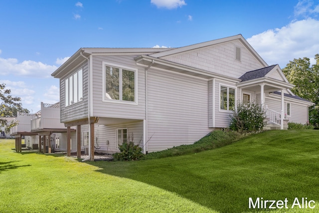 view of home's exterior featuring a lawn