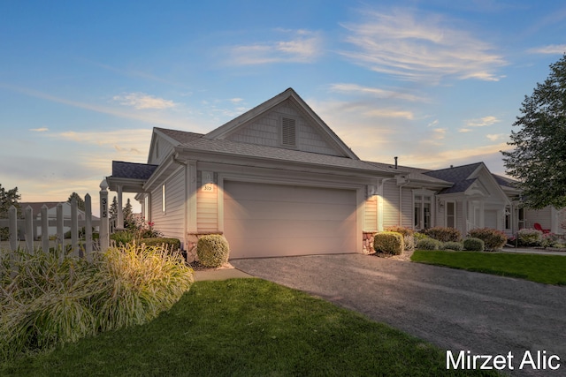 single story home with a garage