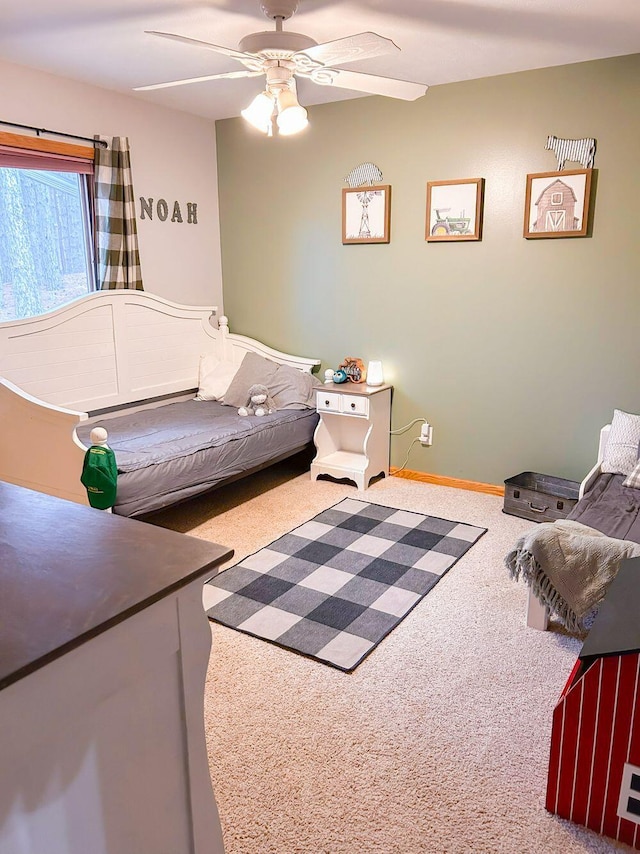 bedroom with carpet flooring and ceiling fan