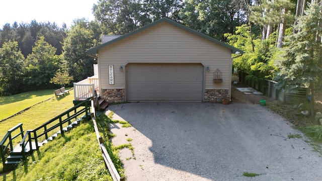 garage with a yard