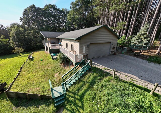 exterior space with a lawn and a garage