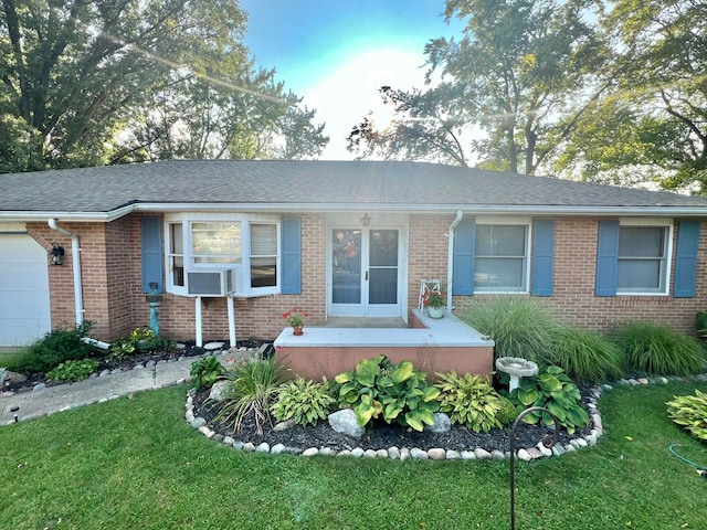 single story home with cooling unit and a front yard