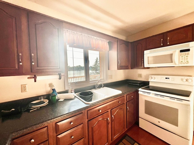 kitchen featuring stove and sink