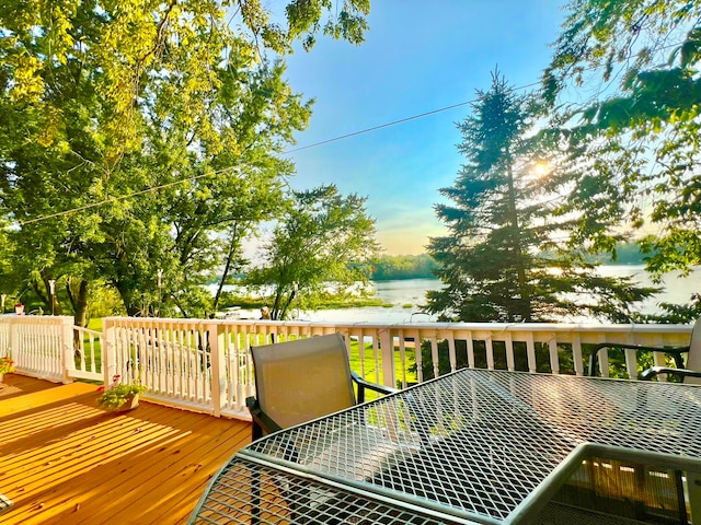 deck featuring a water view