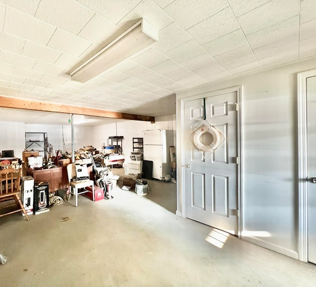 garage with white refrigerator