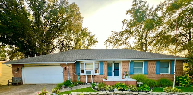 single story home with a garage