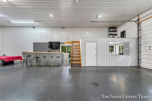 garage with wooden walls