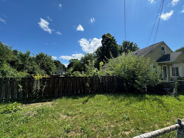 view of yard with fence