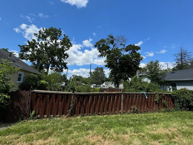 view of yard with fence