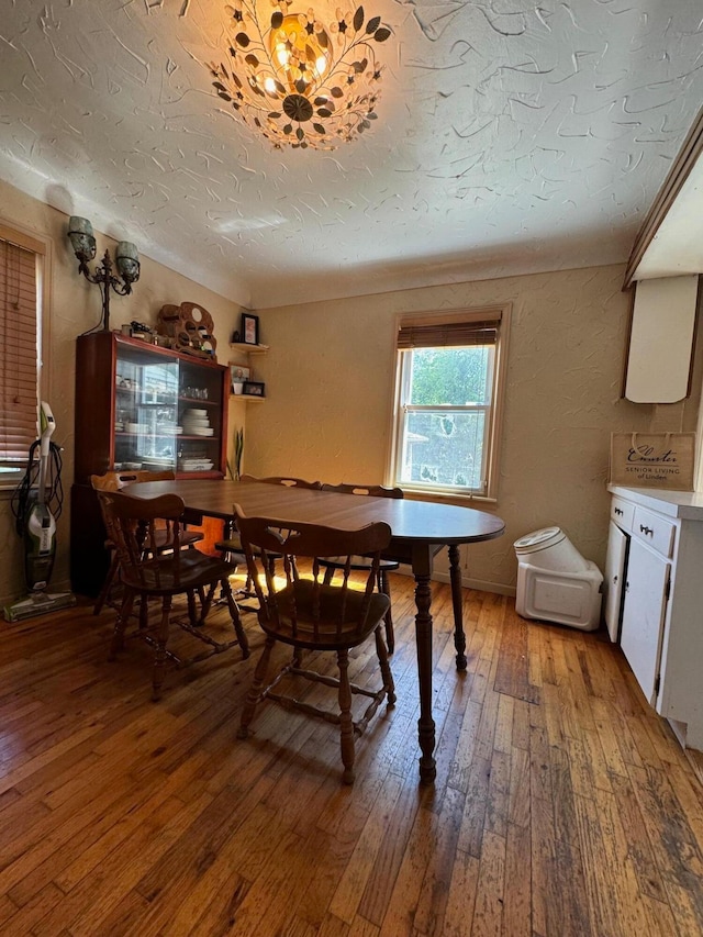 dining area featuring hardwood / wood-style floors