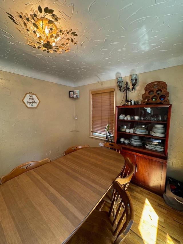 dining area featuring hardwood / wood-style flooring