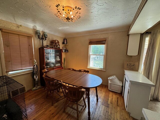 dining area featuring hardwood / wood-style flooring