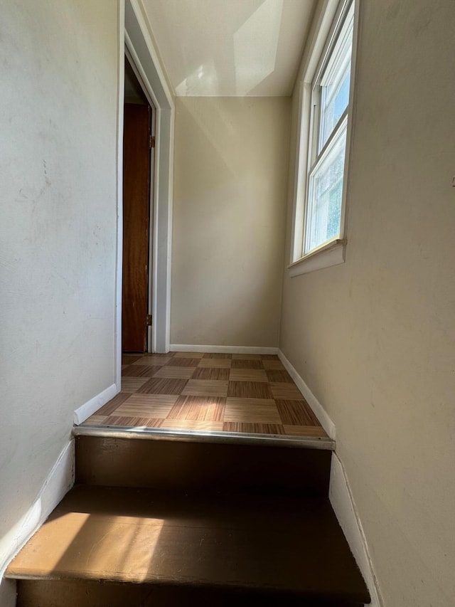 stairway with baseboards