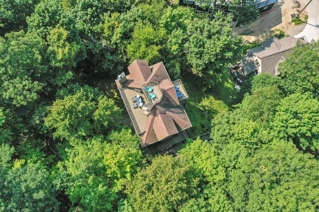 aerial view featuring a view of trees