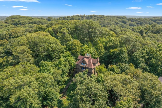 aerial view with a wooded view