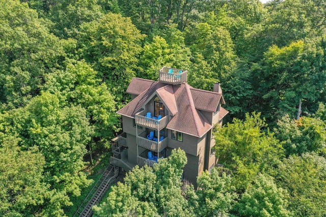 aerial view featuring a view of trees