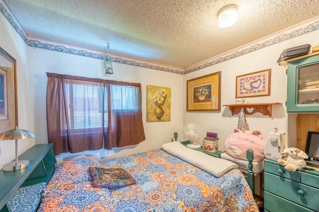 bedroom featuring a textured ceiling