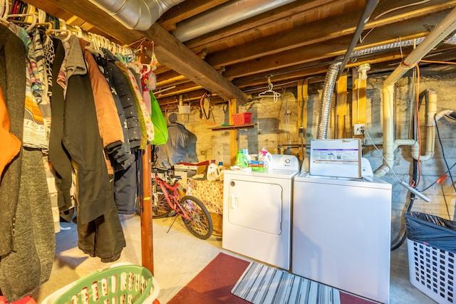 laundry room featuring laundry area and separate washer and dryer